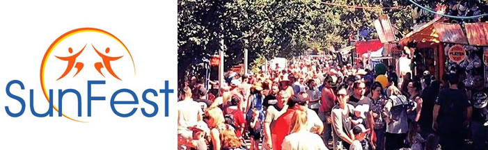 Sunfest lock up with logo and people enjoying the festival