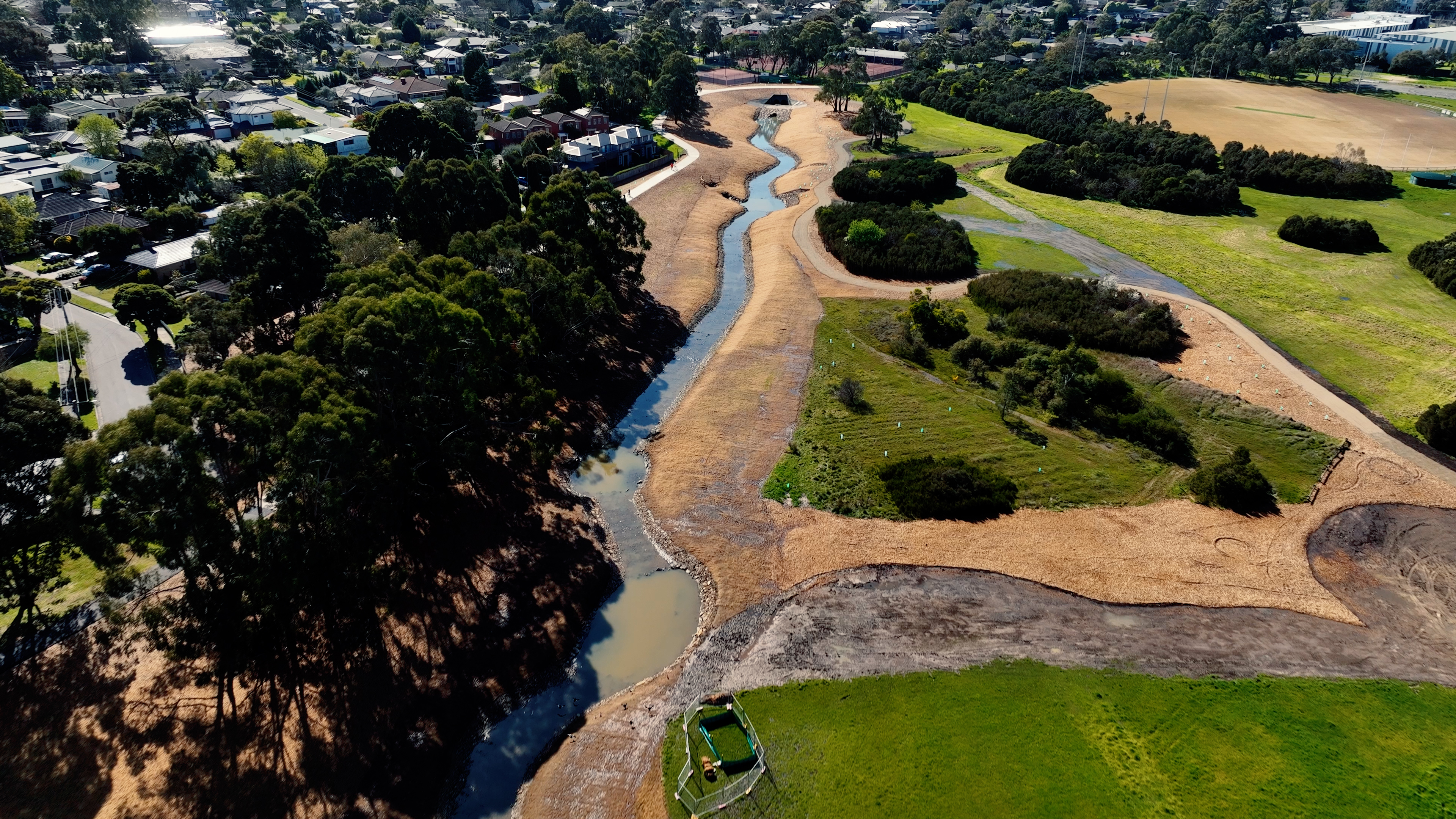 Aerial view of completed Stage 1.2 works zone - Blind Creek, new shared paths and revegetation 