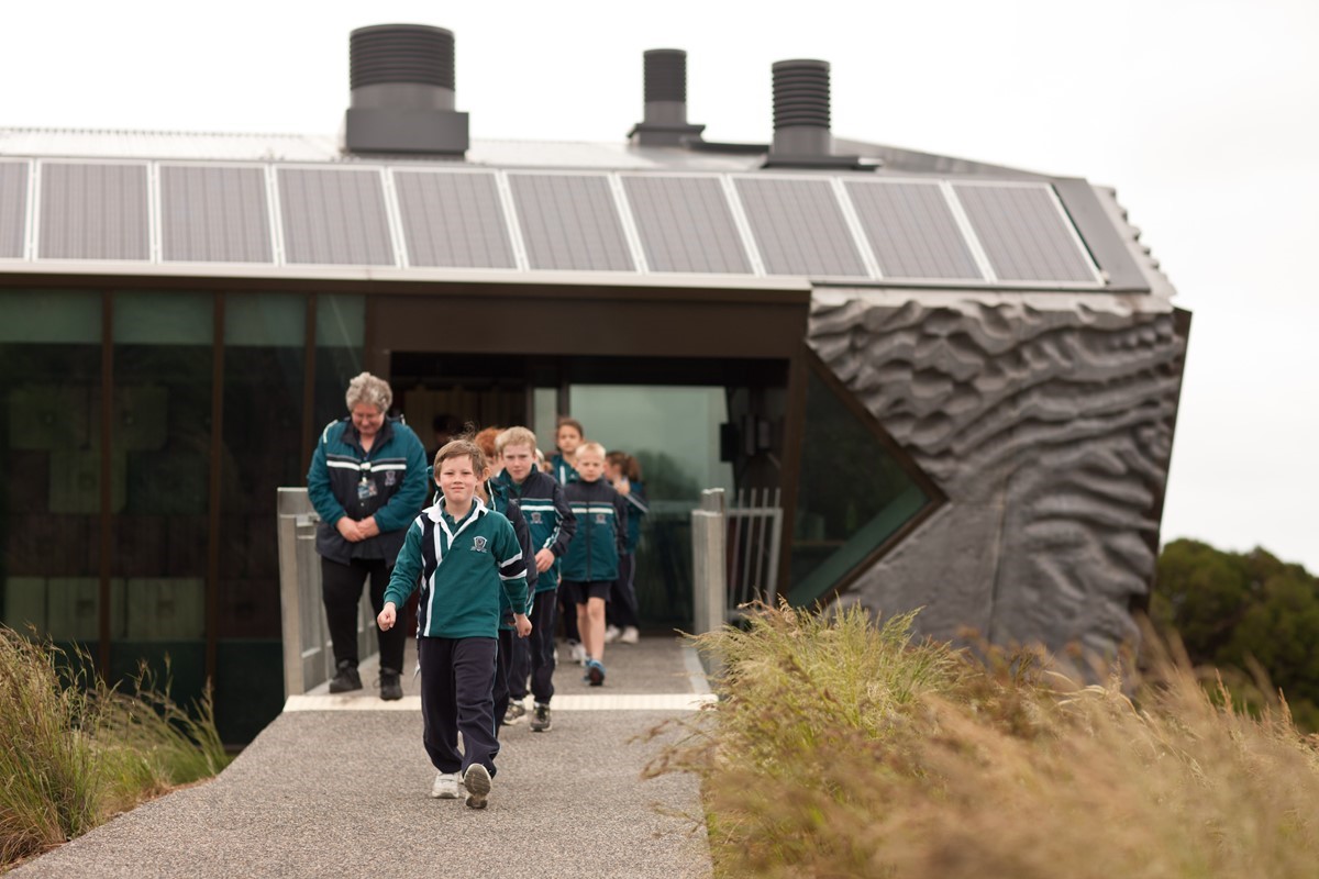 Primary school children exit the Edithvale-Seaford Wetland Education Centre
