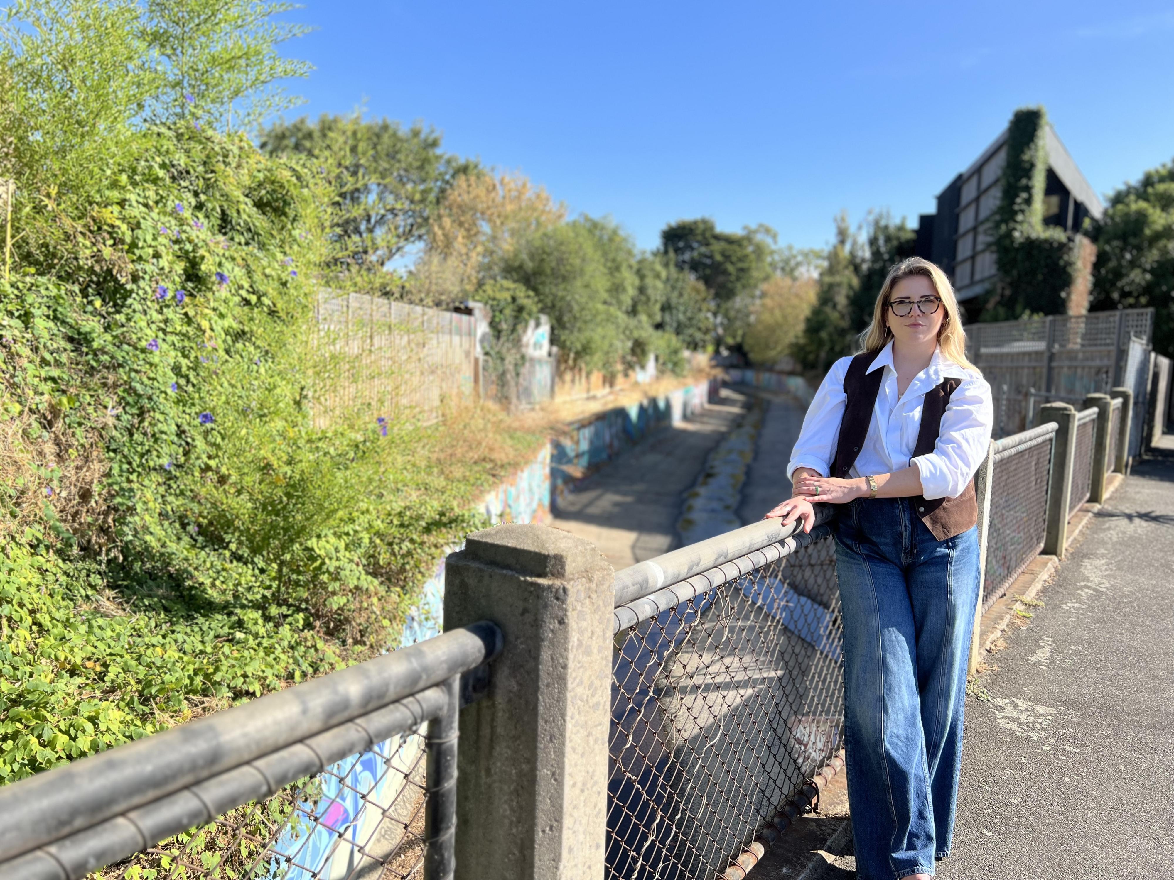New litter officer standing in front of Elster Creek