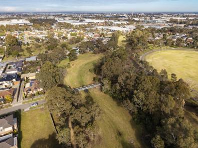 Aerial view of underground drain of Eumemmerring Creek with the pedestrian bridge heading to Butler Street