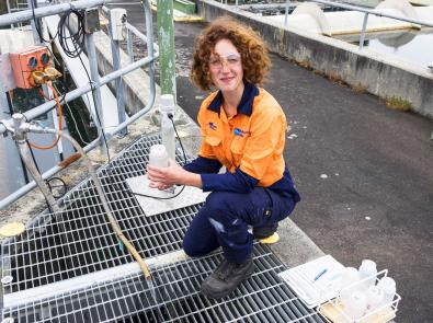 Melbourne Water employee collects water samples at the Winneke Water Treatment Plant