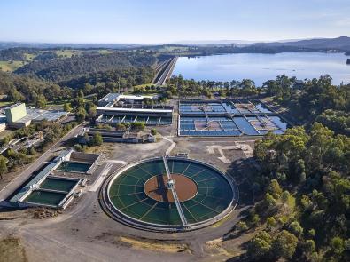 Aerial photo of Winneke Water Treatment Plant, with view of Sugarloaf Reservoir in the background