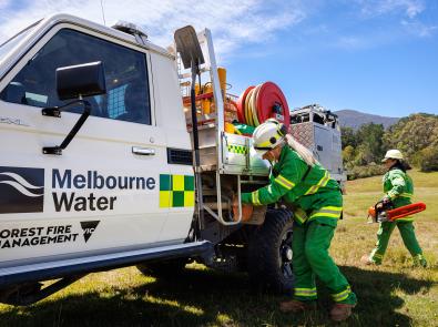 Melbourne Water firefighters with a truck