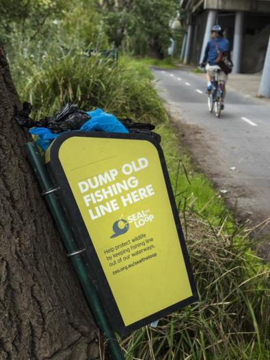 Fishing line bin along bike path in inner Melbourne