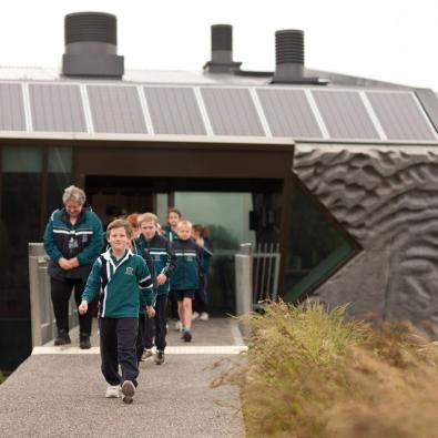 Primary school children exit the Edithvale-Seaford Wetland Education Centre