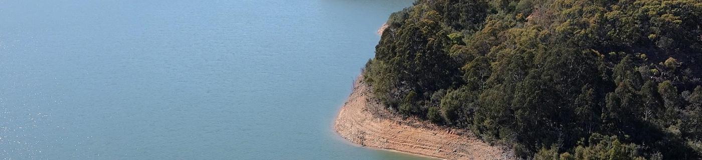 Aerial view of Upper Yarra Reservoir, with water levels low