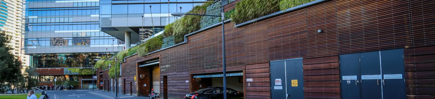 city building with green walls provide shade and insulation