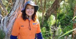 Skye Boyd-Gerny, Natural Resource Management crew member, out on site at work