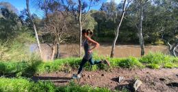 woman running by river