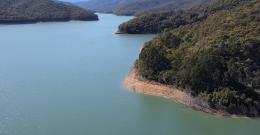 Aerial view of Upper Yarra Reservoir, with water levels low