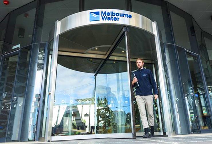 Melbourne Water employee walking out of Docklands head office