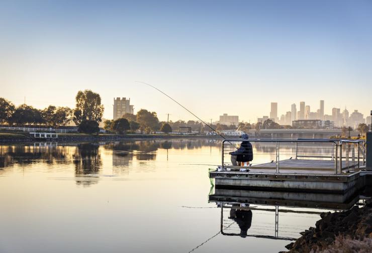Fishing along the Maribyrnong River at Footscray Park