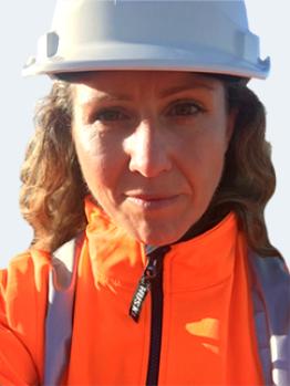 Melbourne Water - Lauren Mittiga woman in high vis and helmet