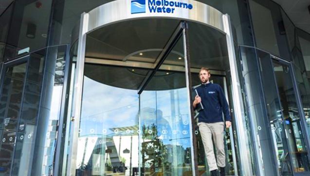 Melbourne Water employee walking out of Docklands head office