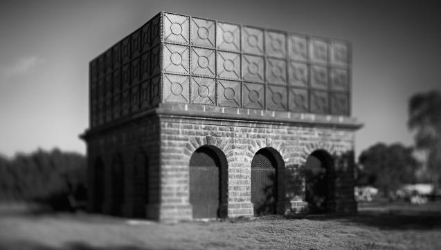 Black and white photo of the historic bluestone water tank at the Western Treatment Plant.