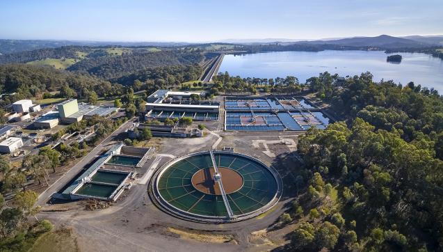 Aerial photo of Winneke Water Treatment Plant, with view of Sugarloaf Reservoir in the background