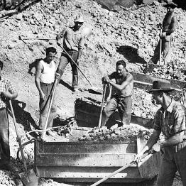 Black and white photograph of workers with picks and shovels
