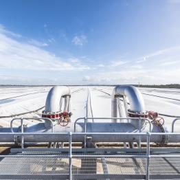 Large polymer cover floats over a sewage treatment lagoon