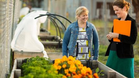 CEO of Hope City Mission community garden with Melbourne Water staff member